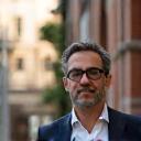 Dario Sartori standing outside Brera home