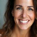 Client Marta Bianchi smiling in her new apartment